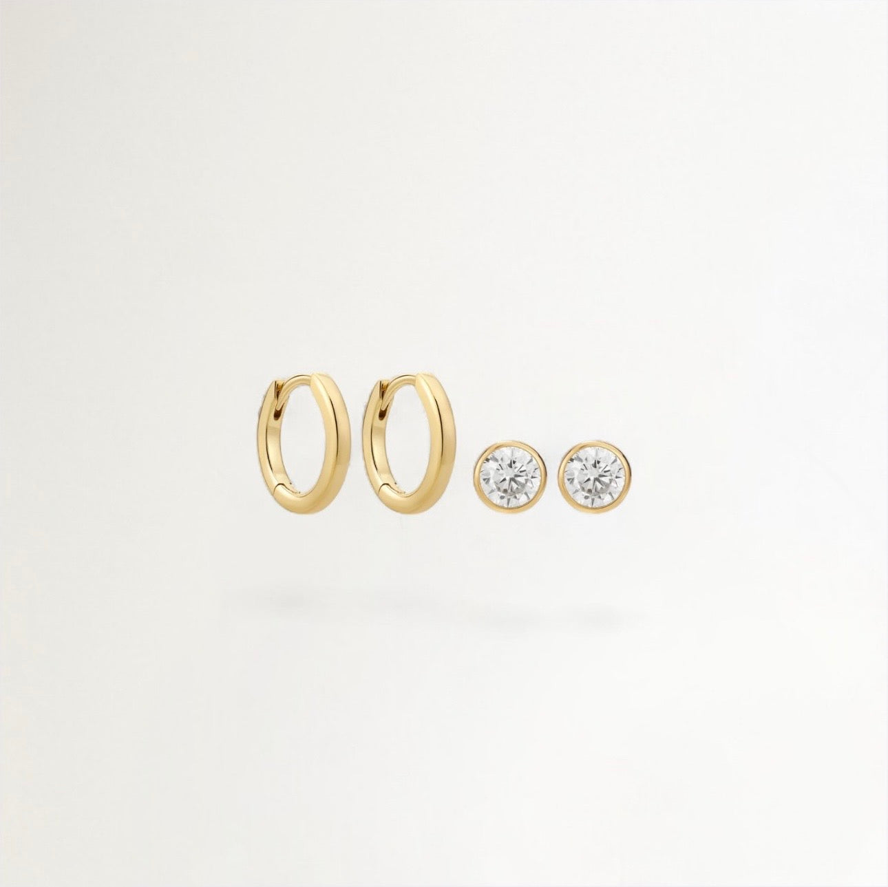 SET DE AROS CIRCONIA PUNTO DE LUZ BAÑADAS EN ORO