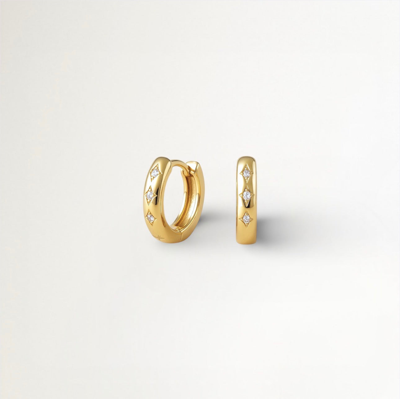 ARGOLLAS 3 PUNTOS EN CIRCONIA BAÑADOS EN ORO