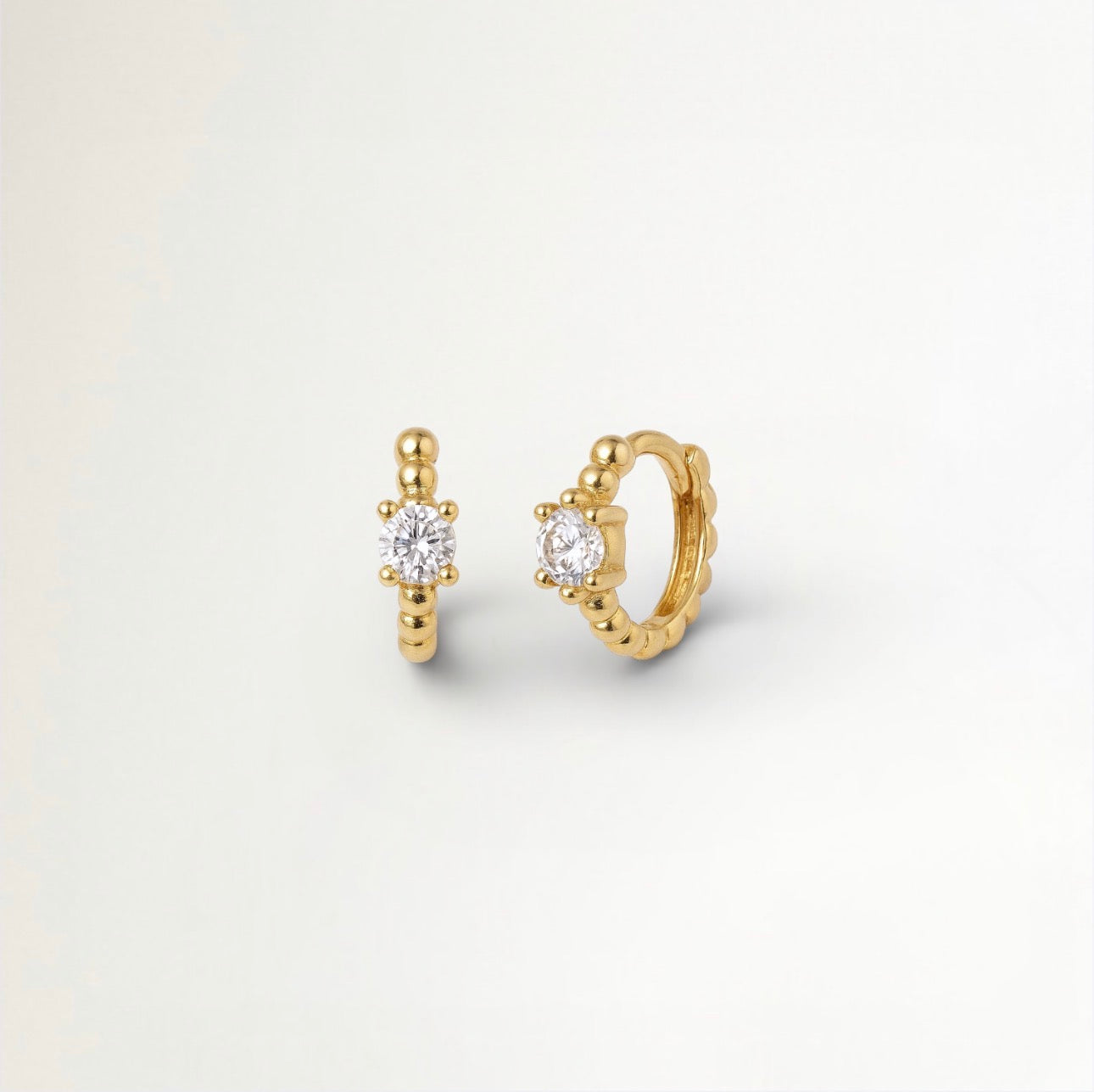 ARGOLLAS CIRCON CENTRAL BAÑADAS EN ORO