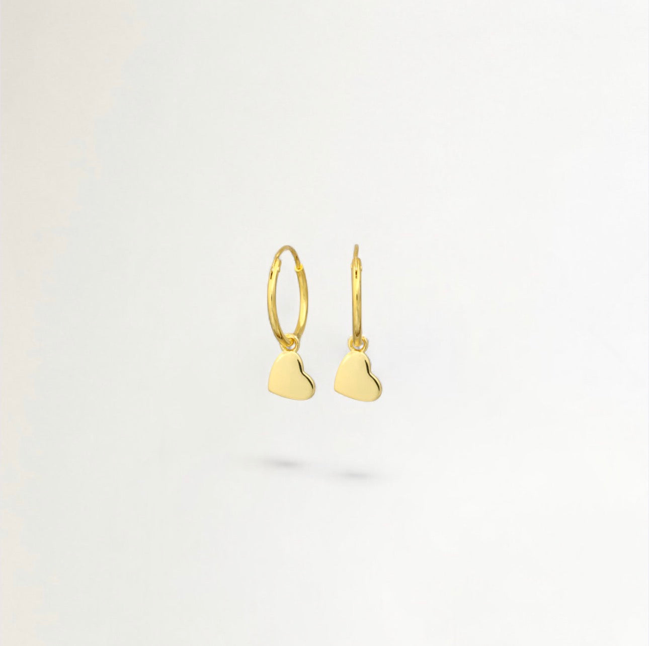 ARGOLLAS SILUETA CORAZÓN BAÑADAS EN ORO