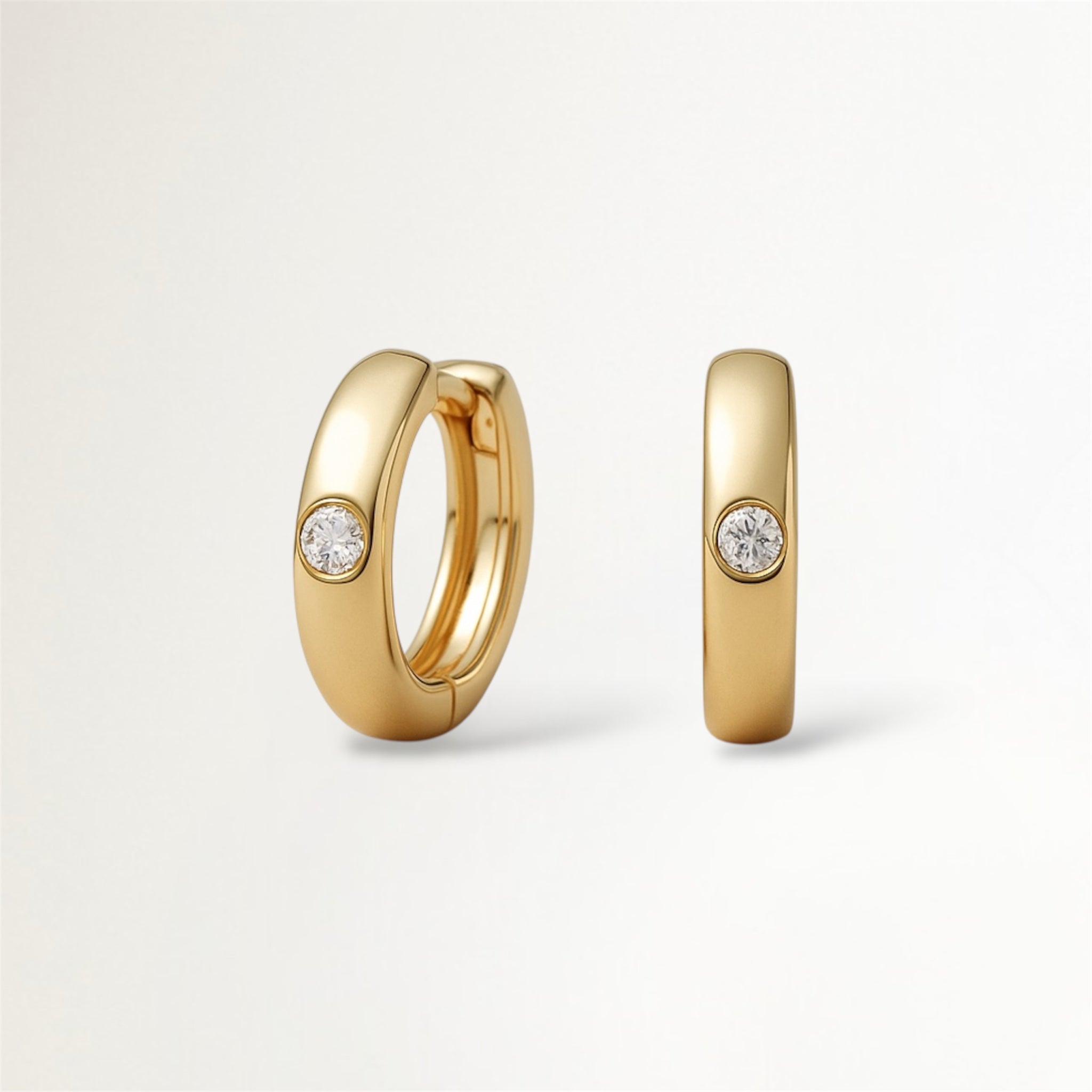 ARGOLLAS CON CIRCON CENTRAL BAÑADAS EN ORO