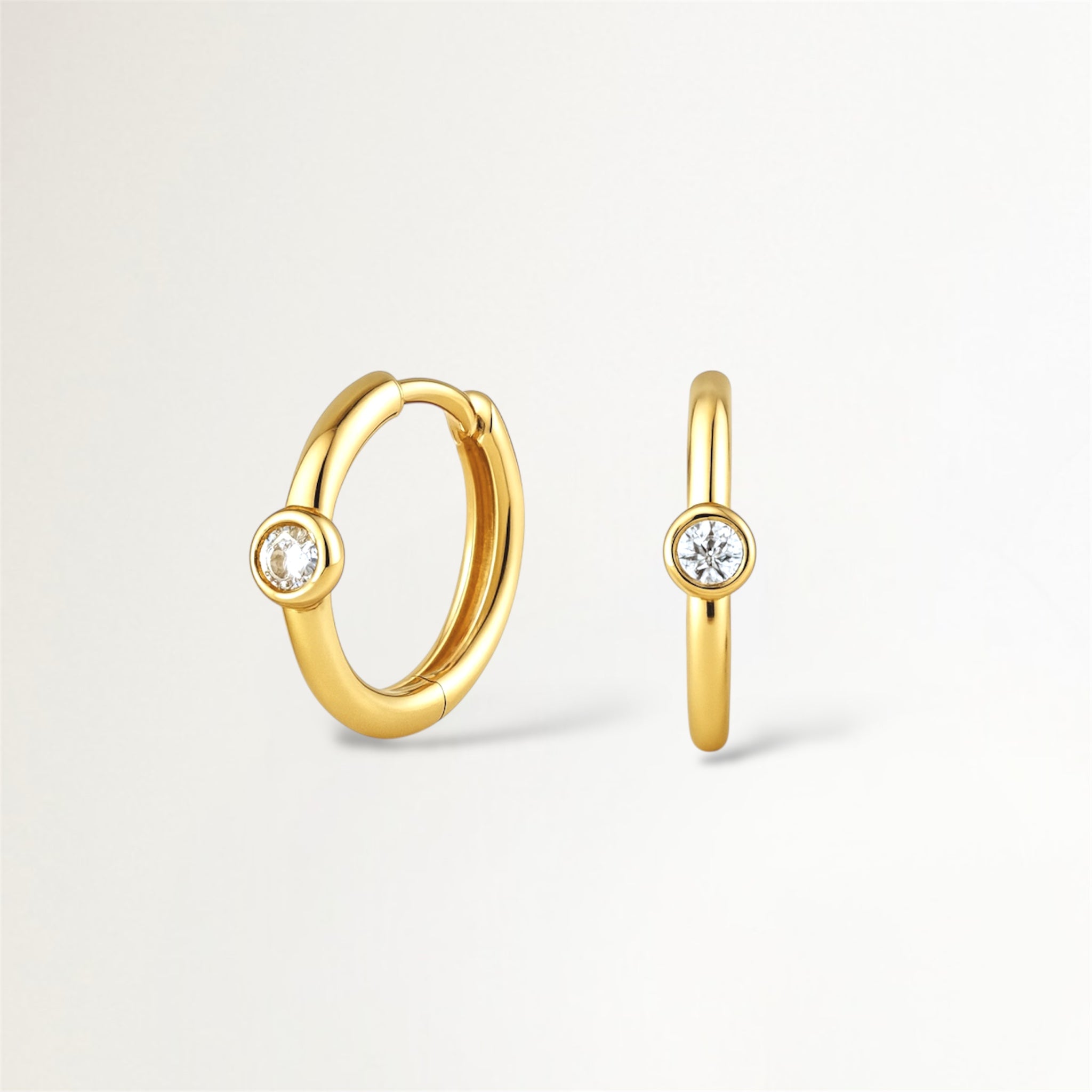 ARGOLLAS CON CIRCON CENTRAL BAÑADAS EN ORO